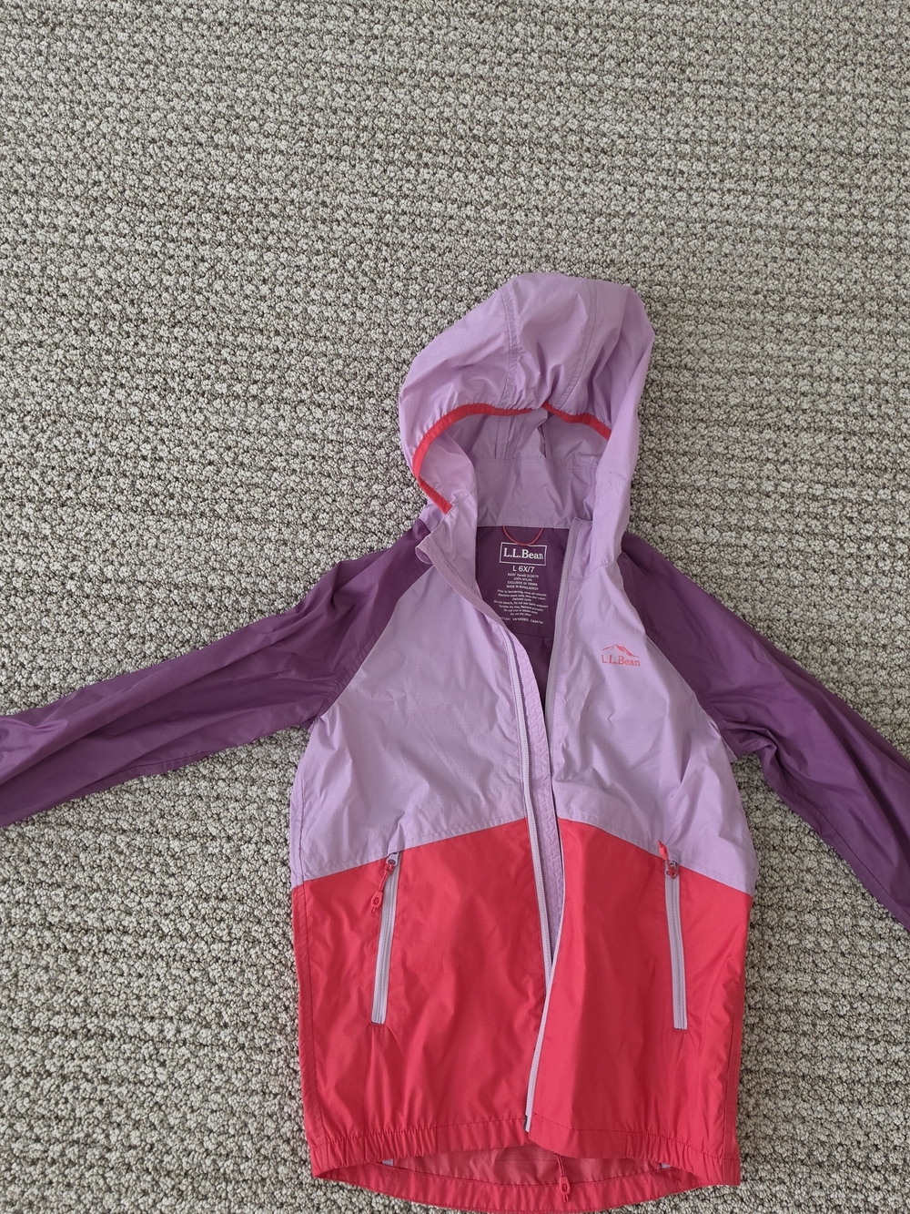 L.L. Bean Girls' Colorblock Hooded Rain Jacket in Purple & Pink. Size 6x/7.